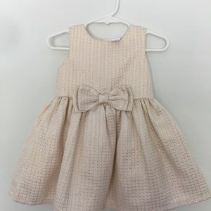 A goldish dress for kids that are 12 months old